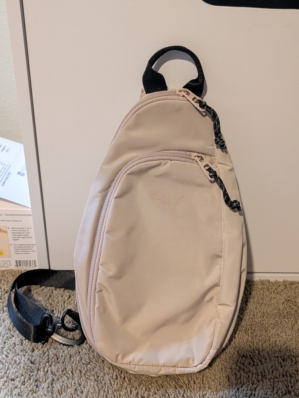 Puma Sling Bag in Light Beige with Black Strap Accents